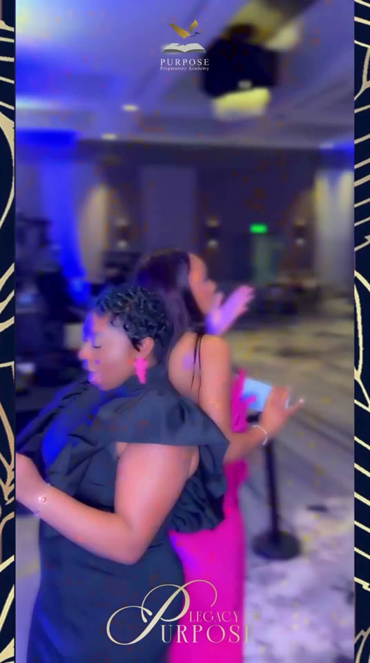 An event guest moves through a blue-lit 360 capture framed by a custom Legacy of Purpose design.