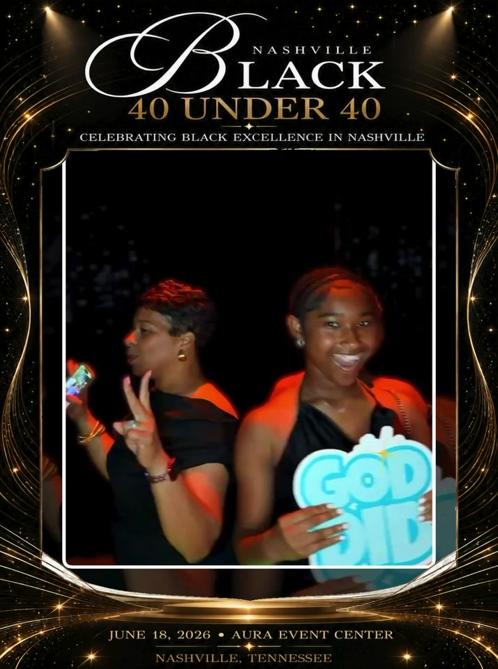 Two guests smile and pose together inside an elegant black-and-gold event overlay in Nashville.